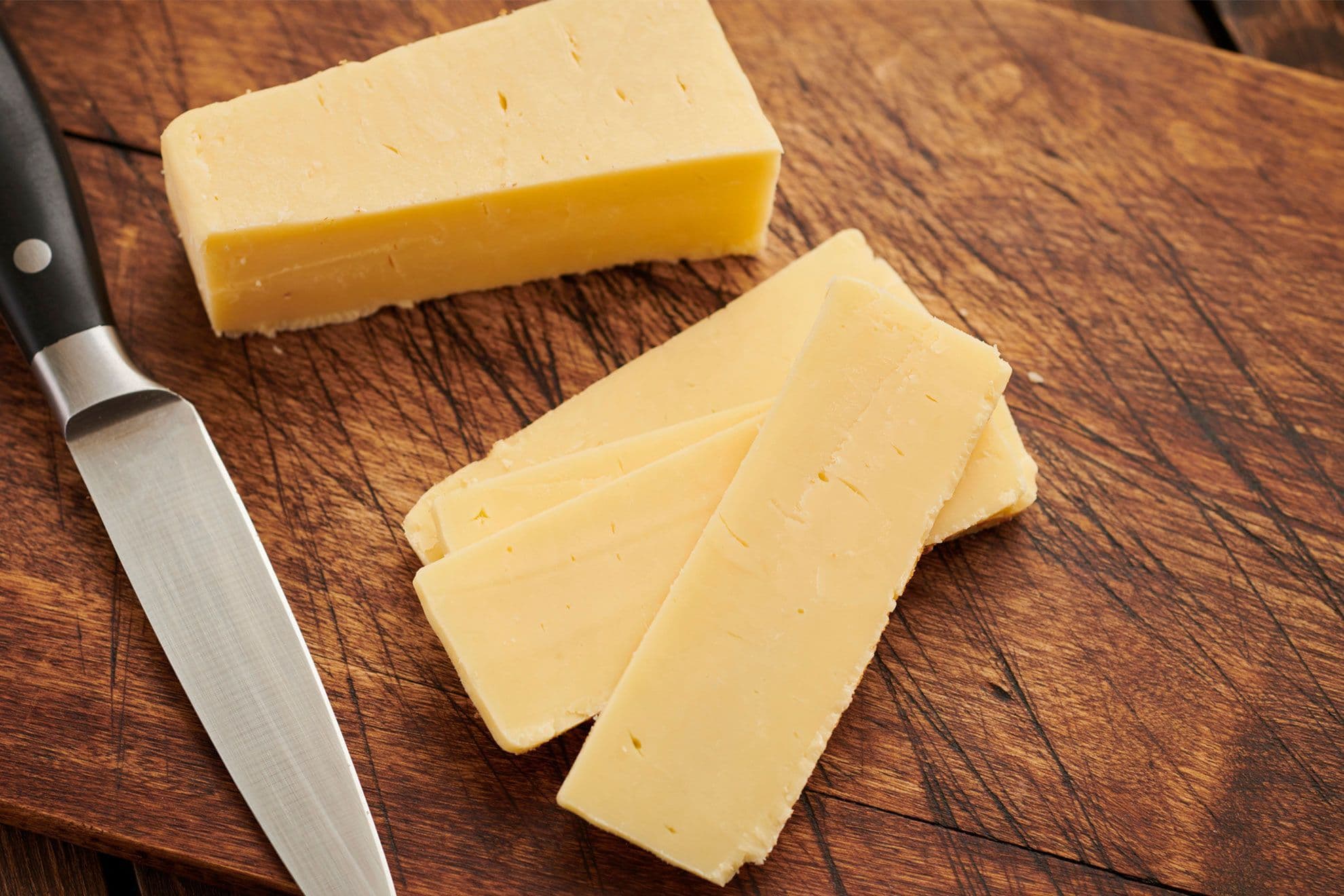 A plate of cheese, showcasing a soft and easy-to-eat option suitable for those with braces.